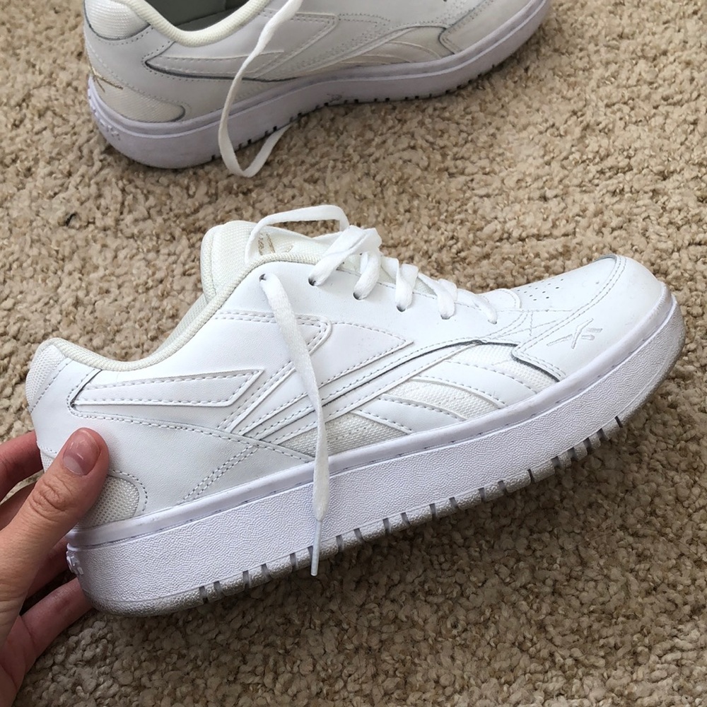 White Reebok sneakers